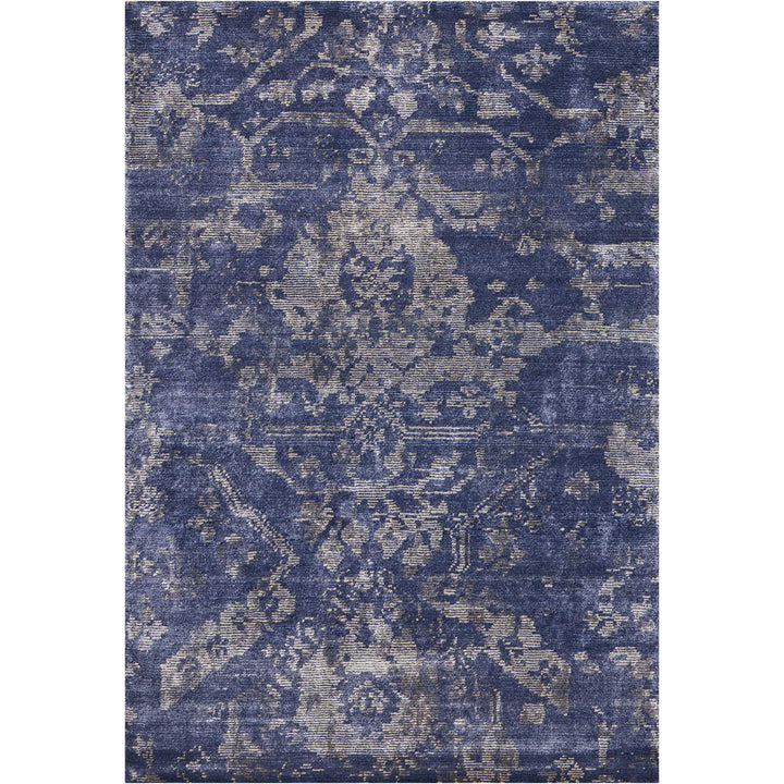 Vintage-inspired blue rug with elegant Oriental influences and faded look.