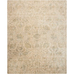 Vintage-inspired rectangular area rug with faded ornate design in beige