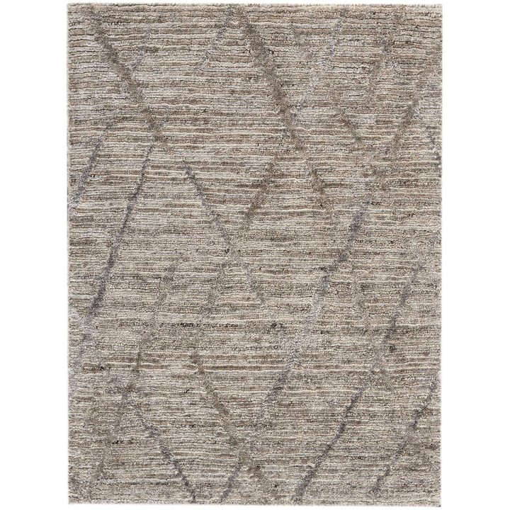 Contemporary rug with textured, mottled appearance showcasing elegant geometric design.