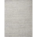Minimalistic rectangular area rug in shades of light grey/silver.