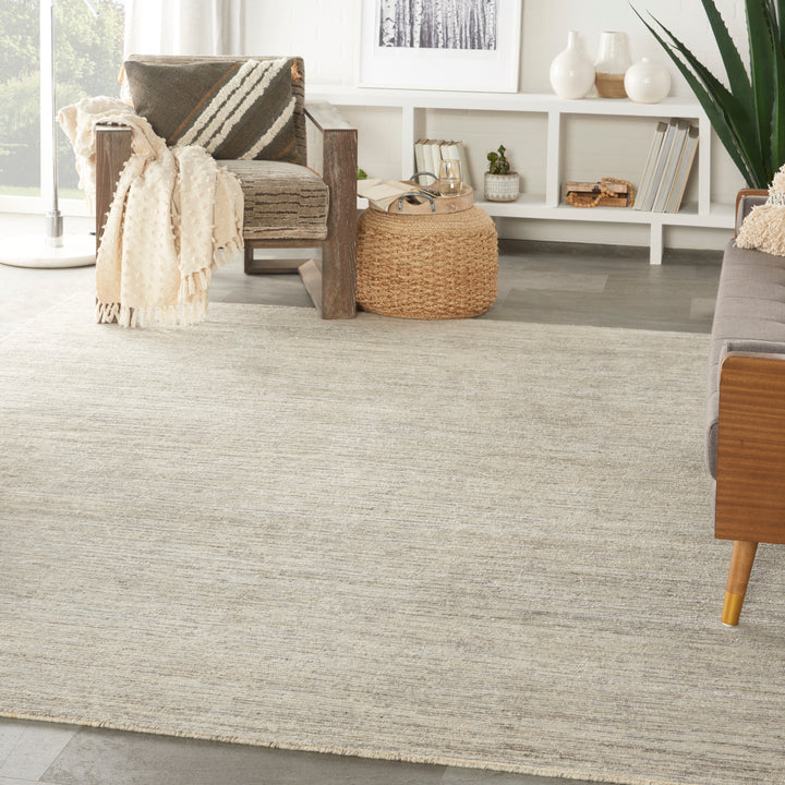 Cozy and modern interior featuring neutral tones and natural materials.