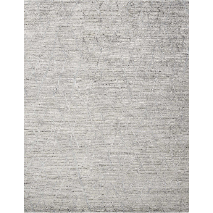 Close-up of a natural woven fabric with varied gray shades.