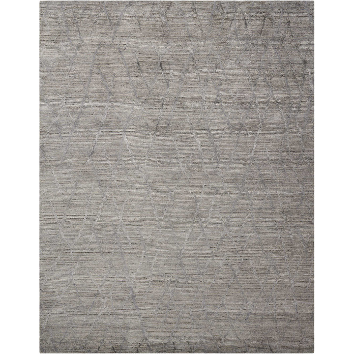 Modern, neutral-tone rug with subtle weathered pattern adds elegant comfort.