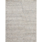 Abstract and modern textured area rug in neutral tones.