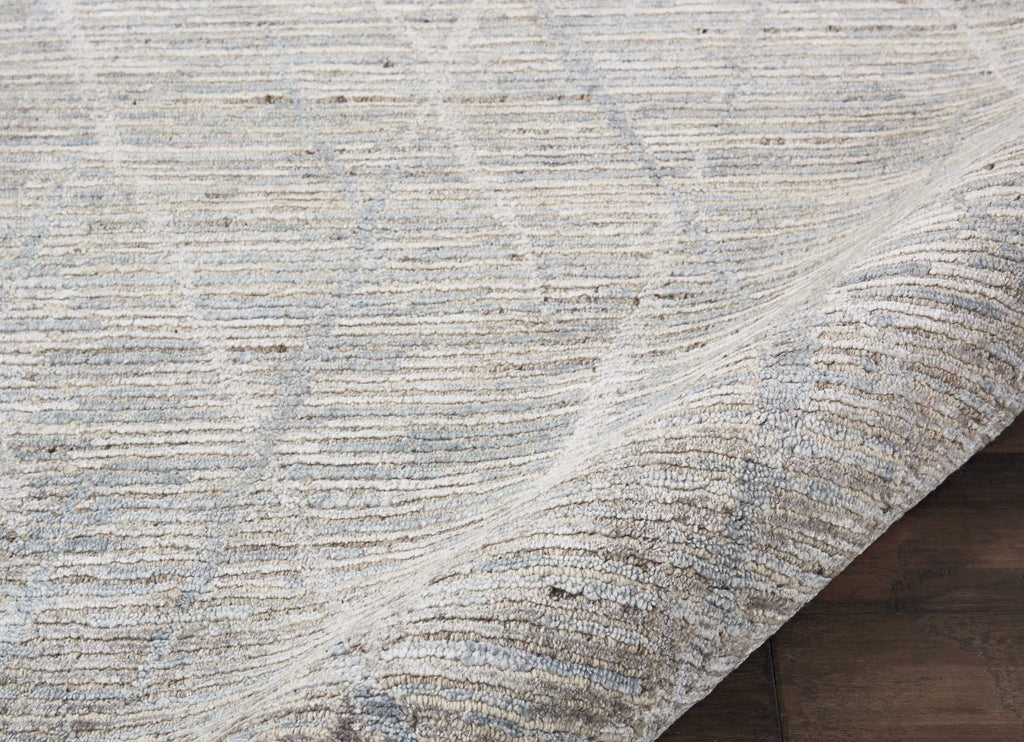 Cozy and stylish home decor: close-up of textured area rug.