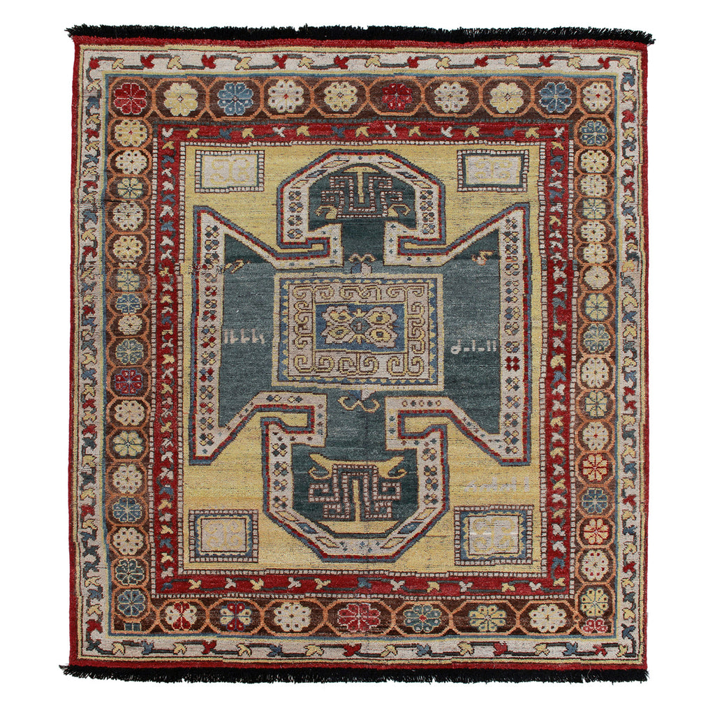Traditional handwoven rug with intricate design and vibrant color palette.