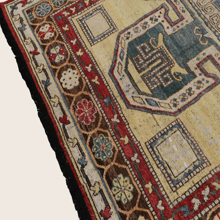 Close-up of a traditional handwoven rug with intricate designs
