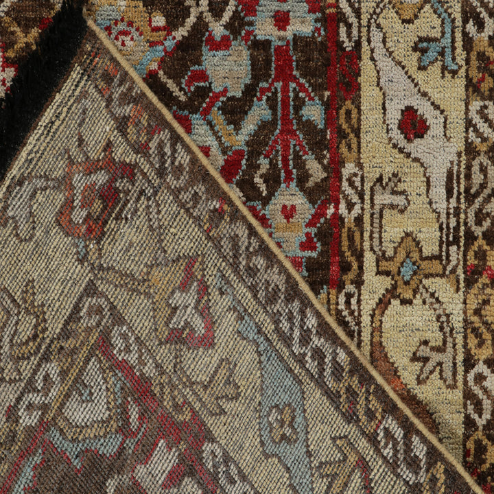 Intricate and colorful handmade rug showcases diverse patterns and motifs.