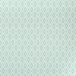 Repeating diamond and lozenge pattern in monochromatic light teal.