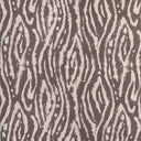 Exotic zebra-inspired fabric with irregular dark wavy stripes on light background.