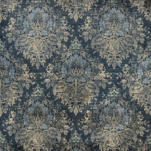 Intricate floral pattern in shades of blue and beige fabric.