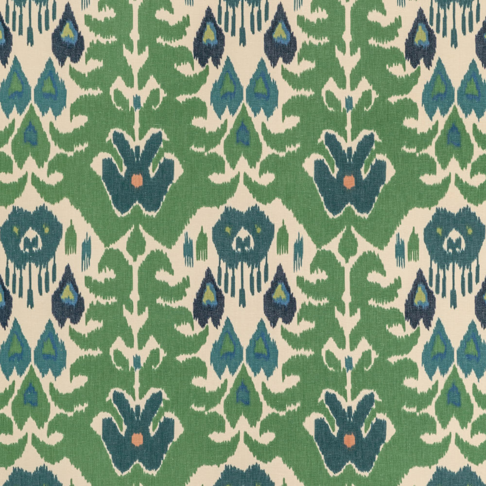 Textile pattern with symmetrical floral design in muted green background.