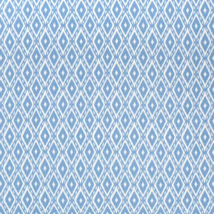 Symmetrical two-toned fabric with diamond-like pattern, creating visual coherence.