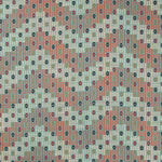 Patterned fabric with intricate motifs in red, black, turquoise, and white.