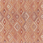 Intricate geometric textile design featuring repeating diamond shapes in warm tones.
