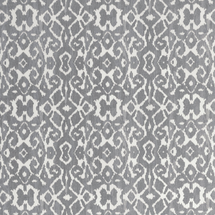 Symmetrical geometric textile pattern in grayscale with abstract motifs.