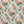 Traditional floral fabric with clusters of pink roses on aqua.