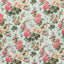 Traditional floral fabric with clusters of pink roses on aqua.