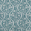 Teal background with a floral motif pattern in cream shade.