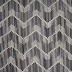 Repetitive chevron pattern in varying shades of gray and white