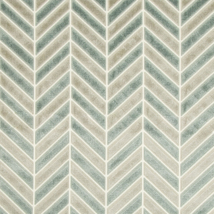 Textile showcasing herringbone pattern in cream and teal colors.