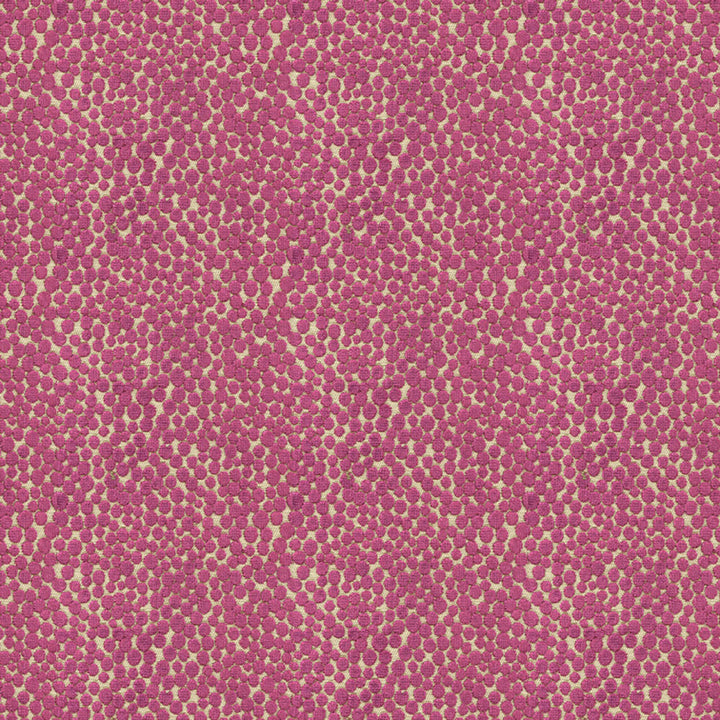 Abstract pattern of golden-yellow shapes on a pinkish-red background.