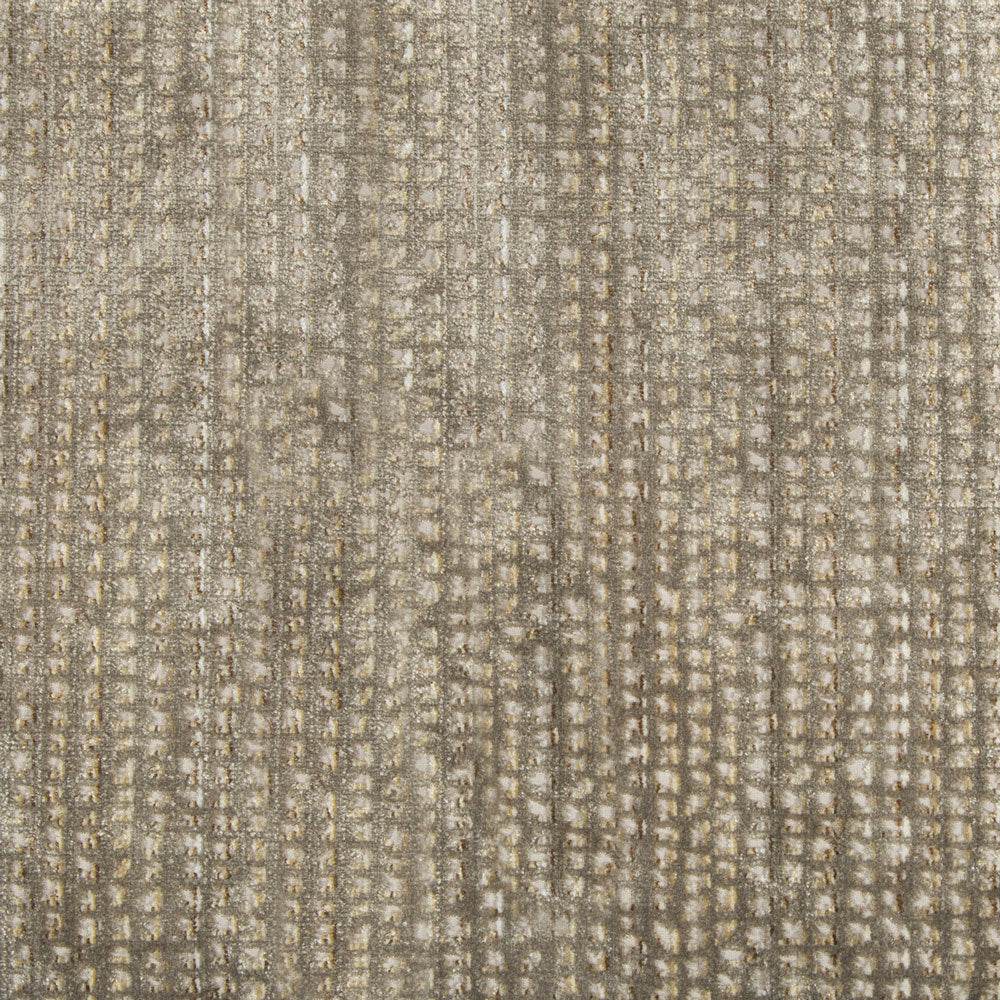 Close-up of textured fabric with repeated vertical lines and dots.