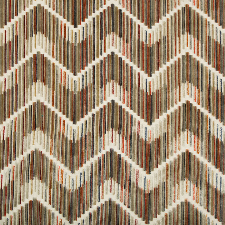 Close-up of textured fabric with a colorful zigzag pattern design.