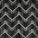 Monochromatic chevron textile brings bold and dynamic pattern to décor.