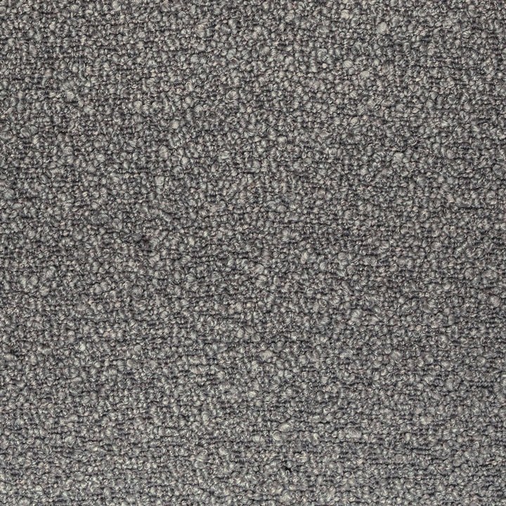 Close-up of gray fabric with tightly looped fibers and speckled appearance.