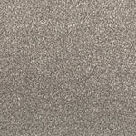 Close-up shot of a monochromatic, textured fabric with a uniform pattern.