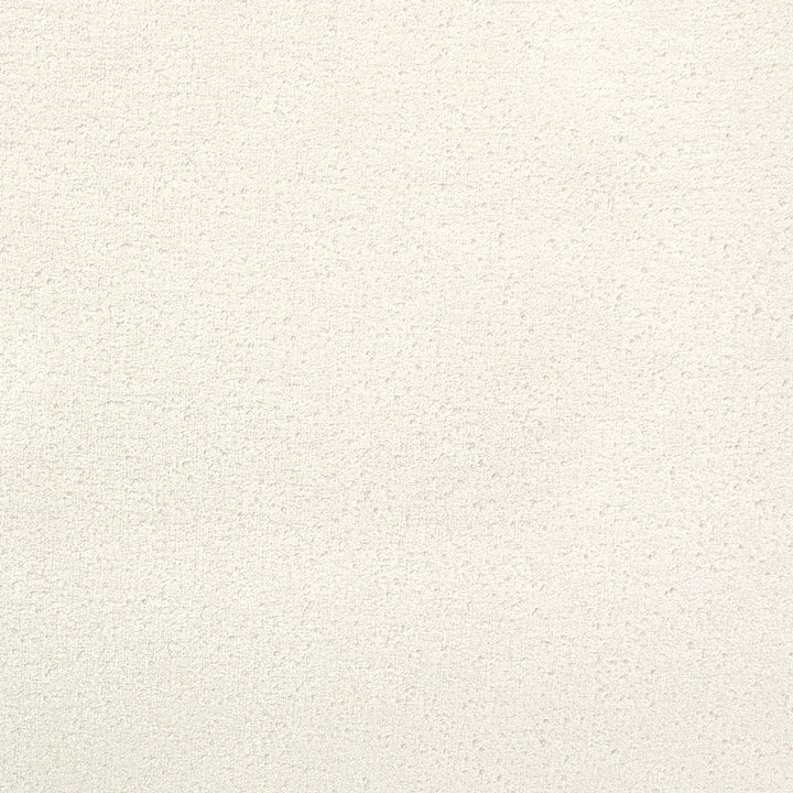 Close-up of a beige textured surface with a gritty effect.