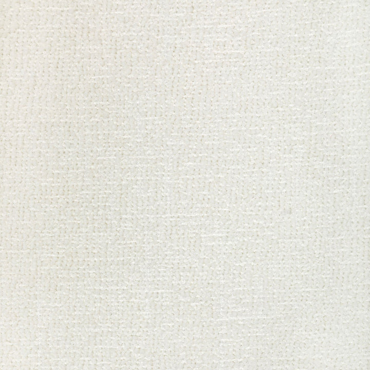 Close-up of off-white fabric with tight, looped pattern texture.