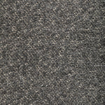 Close-up of a looped pile fabric or carpet with intricate pattern.