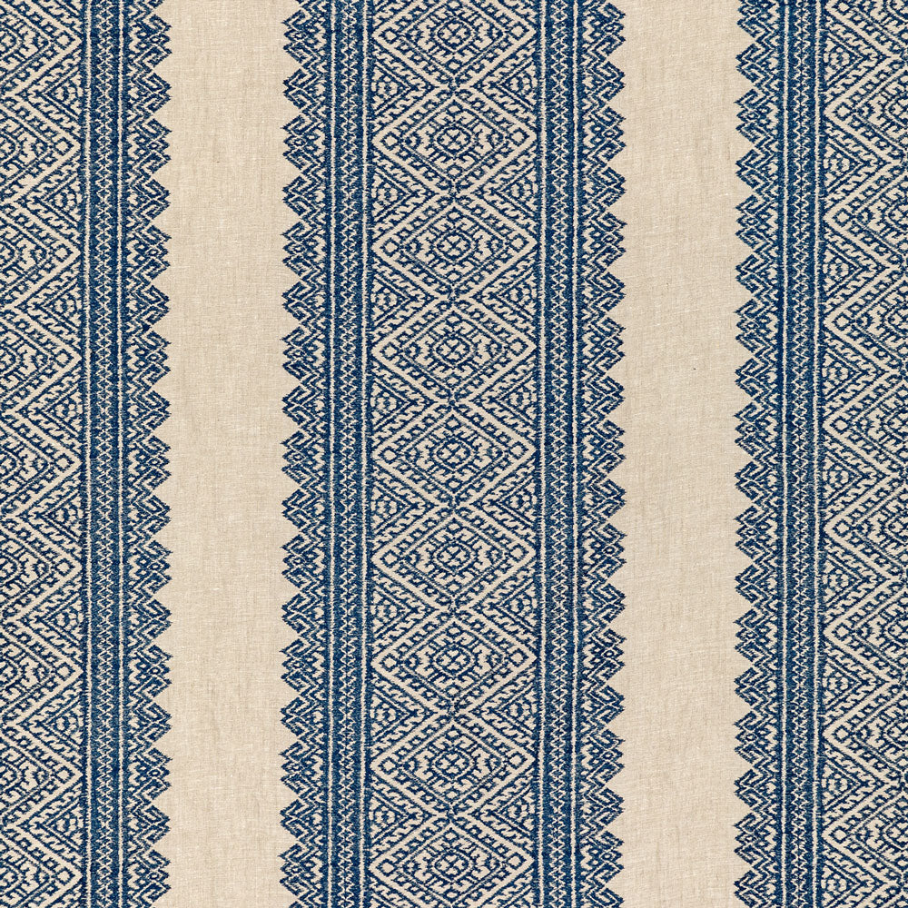 Traditional dark blue fabric with symmetrical geometric designs.