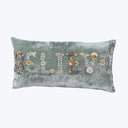 Luxurious rectangular pillow with RELAX embroidery in floral design.