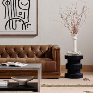 Modern minimalist black tower sculpture with wood grain patterns. - hover