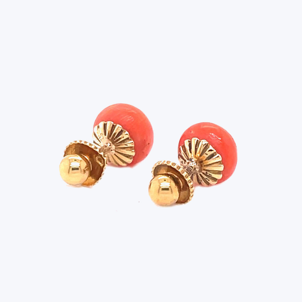 Bold, vintage-inspired red and gold earrings with intricate fluted design.