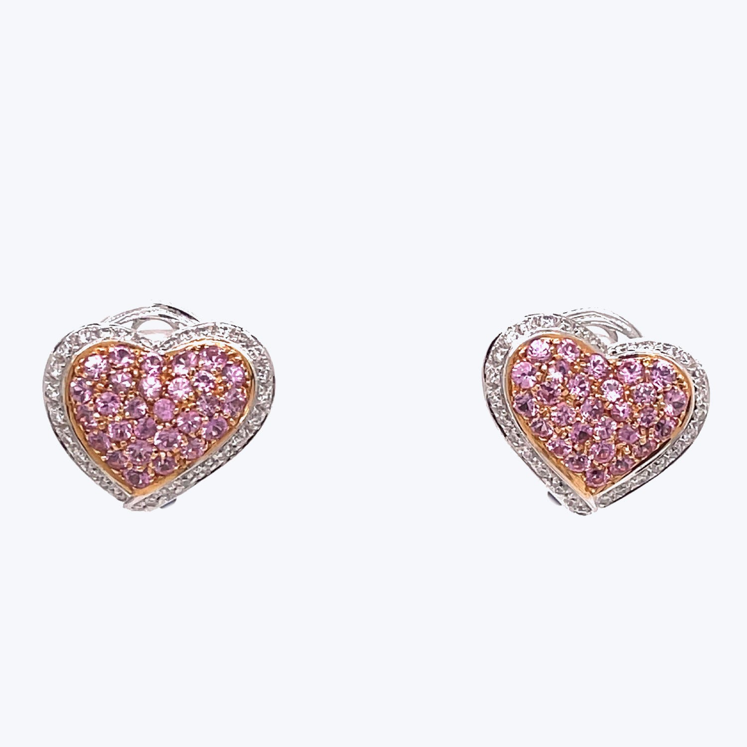Radiant heart-shaped earrings adorned with sparkling gemstones for elegance.