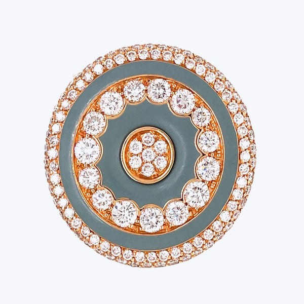 Luxurious, ornate pendant with gemstones and blue enamel design.