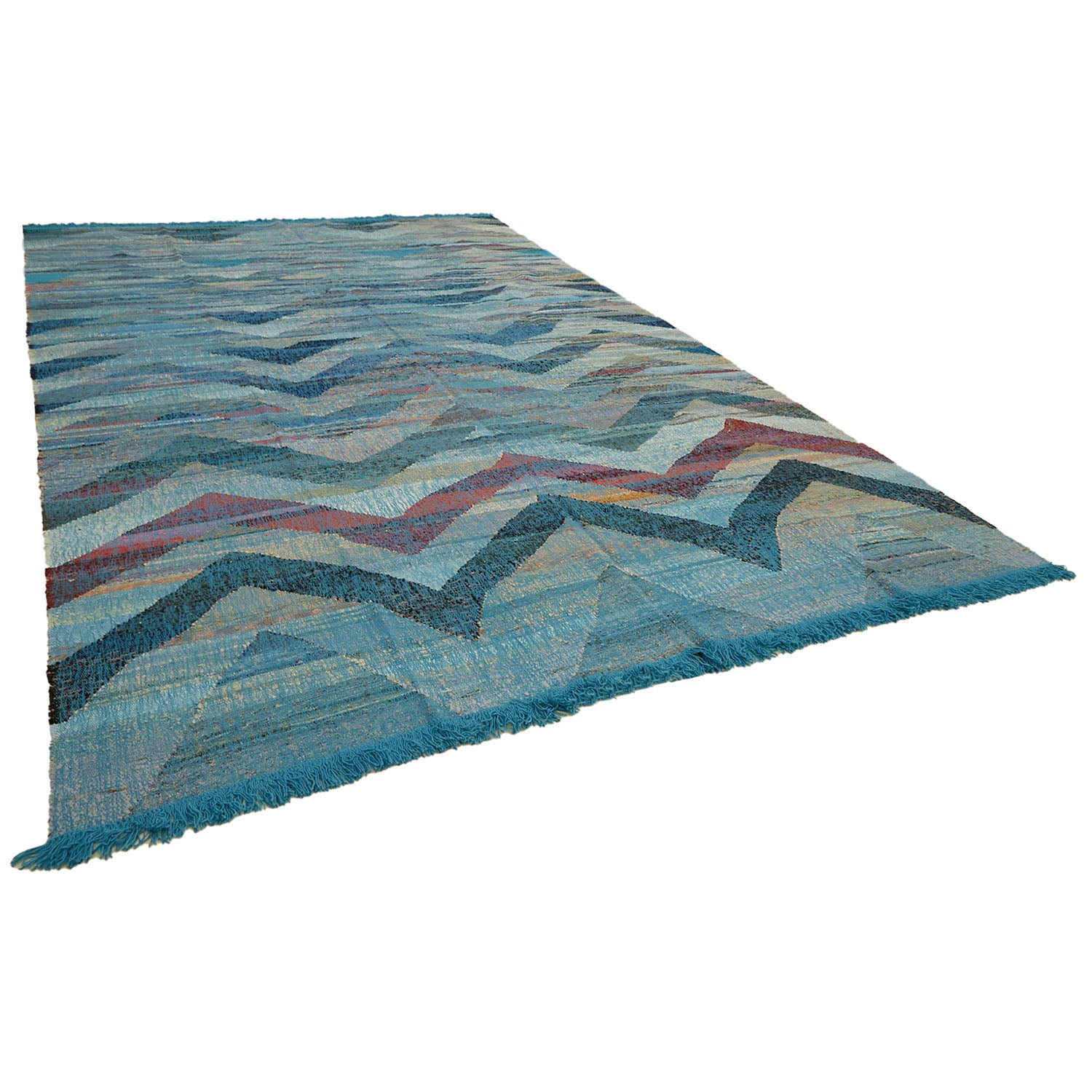 Contemporary rectangular area rug with angular geometric design in blue.
