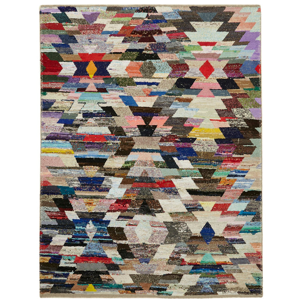 Vibrant, geometric patterned rug with a contemporary and dynamic design.