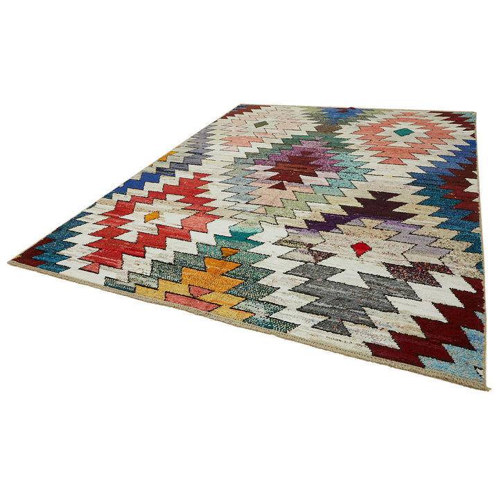 Vibrant, symmetrical geometric rug with tribal-inspired design on white background.