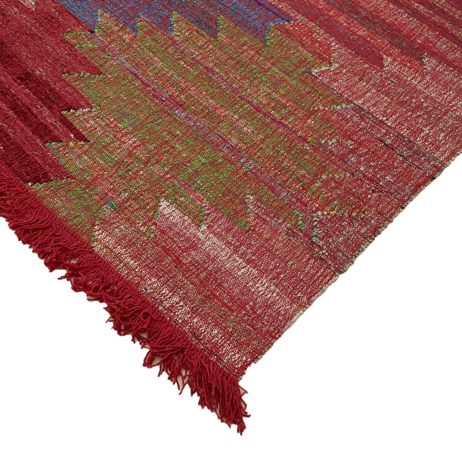 Handcrafted red rug with abstract zigzag pattern and matching fringe