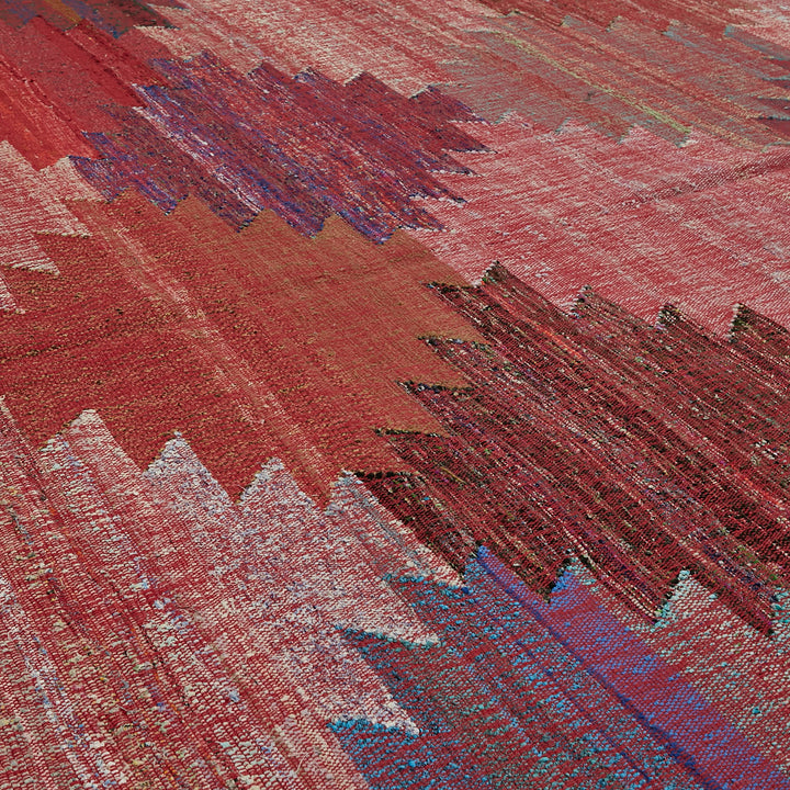 Vibrant red fabric with textured pattern creates a stunning visual.