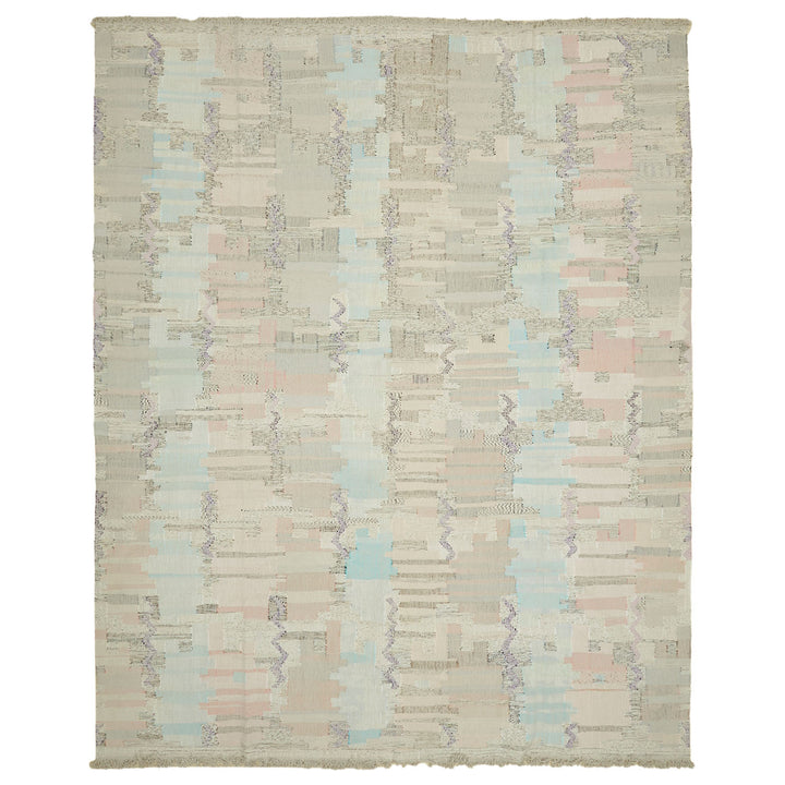 Abstract woven rug with glitch-like pattern adds modern aesthetic.