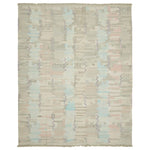 Abstract woven rug with glitch-like pattern adds modern aesthetic.