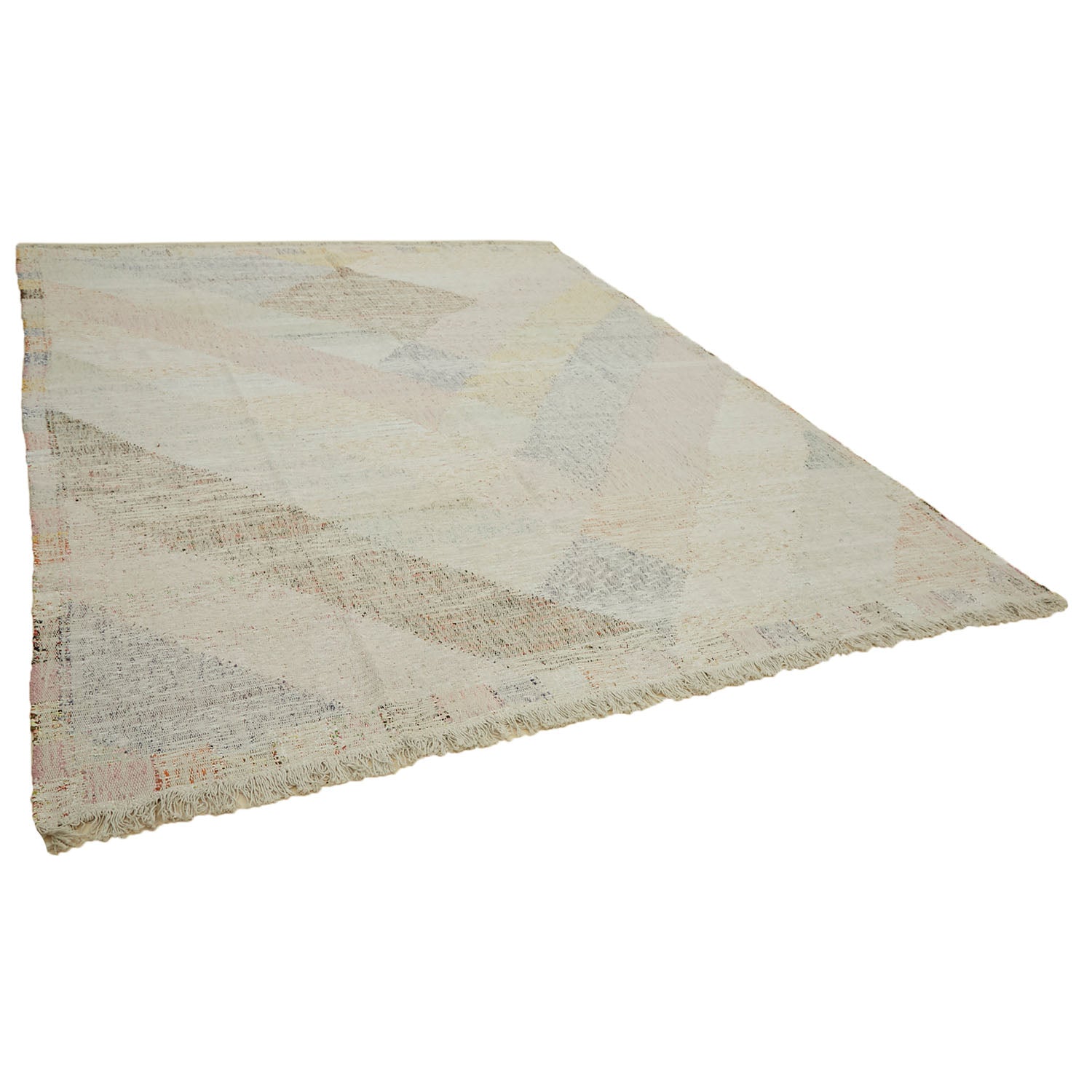 Subtle geometric patterned rug with muted colors and fringed edges.