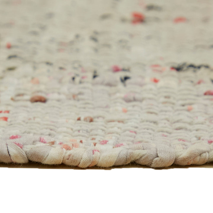 Vibrant, textured fabric showcases intricate weaving and craftsmanship detail.