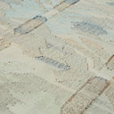 Intricate, pastel-striped fabric showcases skilled craftsmanship and varied textures.